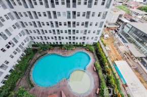 Modern Studio with Cozy Design Serpong Garden Apartment By Travelio